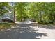 A tree-lined street showcases the neighborhood's charm and well-maintained curb appeal at 9412 Rosalyn Glen Rd, Cornelius, NC 28031