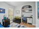 This bedroom has ample natural light, a workstation and a comfortable seating area at 10043 Tepa Pl, Tega Cay, SC 29708
