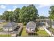 Overhead shot of a home and neighborhood, showcasing the fenced backyard and wooden deck at 1008 Valley St, Kannapolis, NC 28081