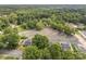 Scenic aerial view of the property showcasing lush surroundings and ample parking spaces at 1008 Valley St, Kannapolis, NC 28081