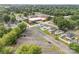 Aerial shot of homes near commercial buildings, showcasing the location and parking areas at 1008 Valley St, Kannapolis, NC 28081