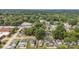 Aerial view of homes in a tree-lined neighborhood, showing the street and greenery at 1008 Valley St, Kannapolis, NC 28081