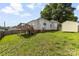 Home's backyard with a deck and a storage shed at 1008 Valley St, Kannapolis, NC 28081