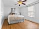 Serene bedroom features hardwood floors, natural light, and neutral tones for a calming atmosphere at 1008 Valley St, Kannapolis, NC 28081