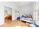 Charming bedroom with a playful theme, featuring wood floors and a decorative bed at 1008 Valley St, Kannapolis, NC 28081