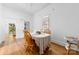 Welcoming dining room featuring hardwood floors and a traditional dining set at 1008 Valley St, Kannapolis, NC 28081