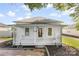 Charming home featuring a covered front porch, brick walkway, and white exterior at 1008 Valley St, Kannapolis, NC 28081