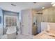 Luxurious bathroom with a soaking tub, glass-enclosed shower, and modern fixtures at 10127 Tallent Ln, Huntersville, NC 28078
