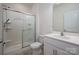 Bathroom featuring a glass enclosed shower and tile flooring at 10410 Bradstreet Commons Way, Charlotte, NC 28215