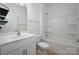 Bathroom with bathtub, shower, and vanity with sink at 10410 Bradstreet Commons Way, Charlotte, NC 28215