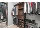 Walk-in closet includes built-in storage for clothes, shoes, and accessories at 108 Shade Tree Cir, Fort Mill, SC 29715
