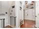 Inviting foyer featuring hardwood floors, coat rack, bench seating and decorative oars at 108 Shade Tree Cir, Fort Mill, SC 29715