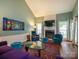 Inviting living room featuring a fireplace, ample seating, and an open layout at 11120 Sevilla Ct, Charlotte, NC 28226