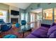This bright living room showcases a fireplace, access to the dining area, and an open layout at 11120 Sevilla Ct, Charlotte, NC 28226