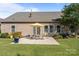 Backyard patio with outdoor seating provides a relaxing space for enjoying the peaceful surroundings at 112 E Neel Ranch Rd, Mooresville, NC 28115