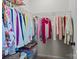 Organized closet with metal shelving provides ample storage for clothing and accessories at 112 E Neel Ranch Rd, Mooresville, NC 28115