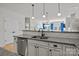 Well-appointed kitchen with stainless steel dishwasher, double sink, and granite countertops at 112 E Neel Ranch Rd, Mooresville, NC 28115