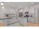 Bright kitchen featuring granite countertops, a center island, and stainless steel appliances at 112 E Neel Ranch Rd, Mooresville, NC 28115
