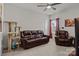 Comfortable living room with leather furniture and a cat tree at 112 E Neel Ranch Rd, Mooresville, NC 28115