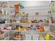 Organized pantry with shelving, offering ample storage for groceries and household goods at 112 E Neel Ranch Rd, Mooresville, NC 28115