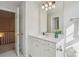 Bright bathroom featuring a white vanity, ample storage, and neutral decor at 11234 Villa Trace Pl, Charlotte, NC 28277