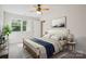 Comfortable bedroom with a neutral color palette and carpeted floor at 11234 Villa Trace Pl, Charlotte, NC 28277