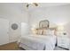 Comfortable bedroom with neutral colors, soft lighting, and carpeted floor at 11234 Villa Trace Pl, Charlotte, NC 28277