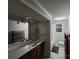 Functional bathroom with a tiled floor, a spacious vanity, large mirror and a shower/tub combo at 11550 Us Hwy 52 N Hwy, Ansonville, NC 28170