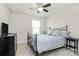Bedroom featuring a queen bed and black dresser at 11733 Mesquite Rd, Huntersville, NC 28078