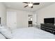 Another view of the bedroom with neutral decor and ceiling fan at 11733 Mesquite Rd, Huntersville, NC 28078