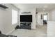 Loft space with TV, shelves, and view to the other bedrooms at 11733 Mesquite Rd, Huntersville, NC 28078