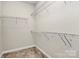 Walk-in closet featuring wire shelving and carpeted floor at 11733 Mesquite Rd, Huntersville, NC 28078