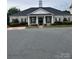 Community clubhouse features stately columns, well maintained landscaping and classic architectural details at 1177 Triece Ln, Charlotte, NC 28215
