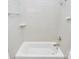 Bathroom shower and tub combo with white tiles at 12300 Caldwell Rd, Charlotte, NC 28213