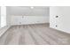 Bright bedroom with vaulted ceilings, neutral carpet, and ample natural light, perfect for a cozy retreat at 12300 Caldwell Rd, Charlotte, NC 28213