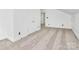 Bedroom featuring neutral carpet, a double closet, and ample space for relaxation and personalization at 12300 Caldwell Rd, Charlotte, NC 28213
