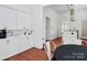 Bright dining area featuring white cabinets and storage for serving and entertaining at 12300 Caldwell Rd, Charlotte, NC 28213
