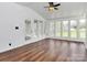 Bright sunroom filled with lots of natural light and neutral flooring at 12300 Caldwell Rd, Charlotte, NC 28213