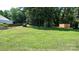 Well-maintained backyard with a shed and lush green grass at 1327 Mount Ulla Hwy, Mooresville, NC 28115
