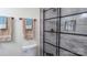 Bathroom featuring a modern shower with glass door and towel racks at 1327 Mount Ulla Hwy, Mooresville, NC 28115