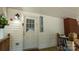Welcoming front porch with a cozy chair at 1327 Mount Ulla Hwy, Mooresville, NC 28115