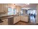 Spacious kitchen with ample counter space and cabinetry, ideal for cooking and entertaining guests at 1327 Mount Ulla Hwy, Mooresville, NC 28115