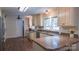 Well-appointed kitchen featuring stainless steel appliances and plenty of countertop space for your cooking needs at 1327 Mount Ulla Hwy, Mooresville, NC 28115