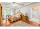 Bright bedroom with a large window and a connected bathroom that offers plenty of natural light at 136 Pink Orchard Dr, Mooresville, NC 28115