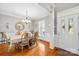Elegant dining room with hardwood floors and stylish chandelier lighting at 136 Pink Orchard Dr, Mooresville, NC 28115