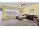 Sunny bedroom filled with natural light features a comfortable bed, a dresser and a charming window seat with a view at 1398 Kent Downs Sw Ave # 52, Concord, NC 28027