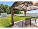 Relaxing gazebo featuring comfortable seating and stylish décor for outdoor enjoyment in the backyard at 1398 Kent Downs Sw Ave # 52, Concord, NC 28027