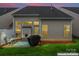 Backyard patio has a grill and seating, a great space for entertaining at 1418 Skidaway Nw St # 427, Concord, NC 28027