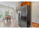 Bright breakfast nook with stainless steel refrigerator and views of the bay window at 1418 Skidaway Nw St # 427, Concord, NC 28027