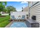 Cozy patio with comfortable seating, a decorative rug, and a privacy fence for outdoor enjoyment at 1418 Skidaway Nw St # 427, Concord, NC 28027